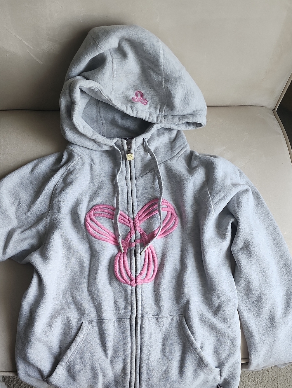 TNA Light Gray Hoodie with Pink Embroidered Design